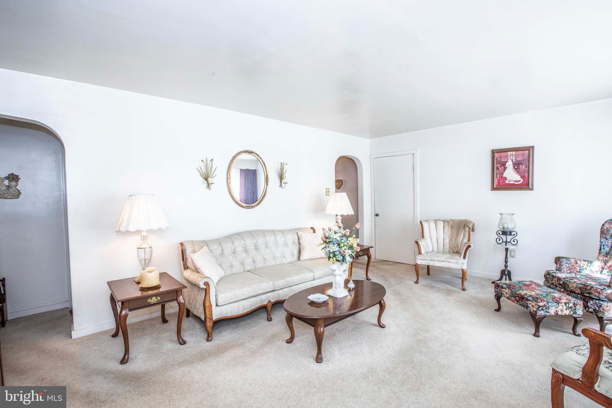 3328 Stoudts Ferry Bridge Road Reading, PA 19605 - Photo 3 of 29 a living room with furniture and a table