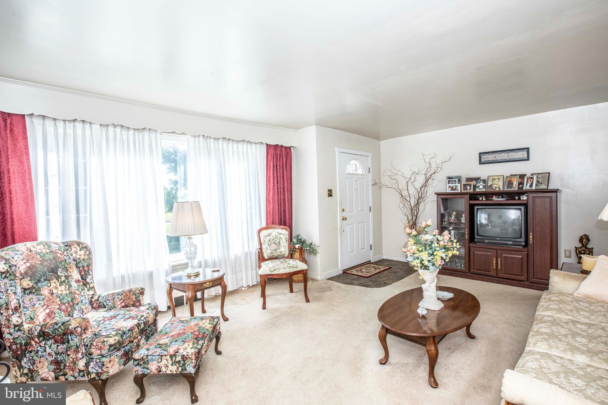 3328 Stoudts Ferry Bridge Road Reading, PA 19605 - Photo 4 of 29 a living room with furniture and a large window