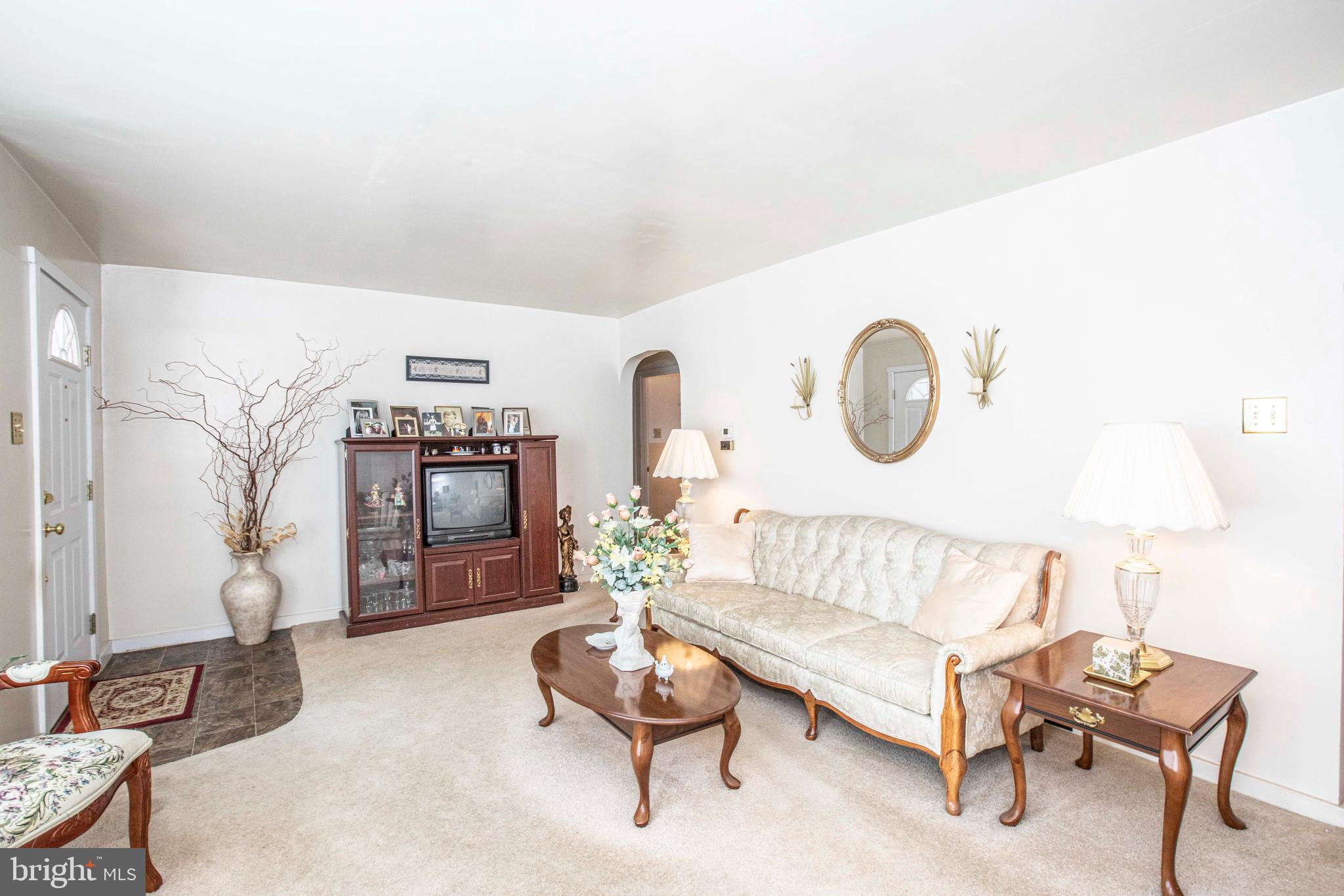 3328 Stoudts Ferry Bridge Road Reading, PA 19605 - Photo 5 of 29 a living room with furniture and a chair