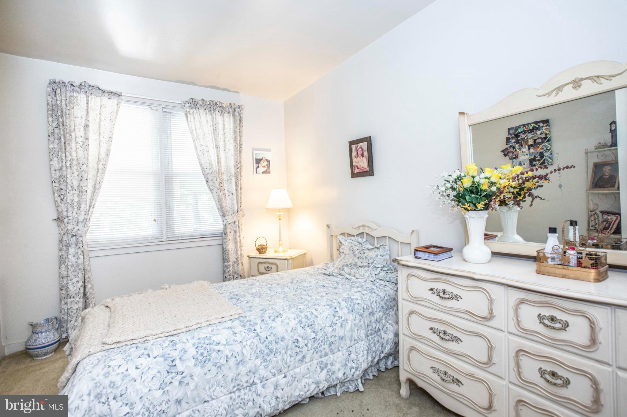 3328 Stoudts Ferry Bridge Road Reading, PA 19605 - Photo 6 of 29 a bedroom with a bed and a dresser