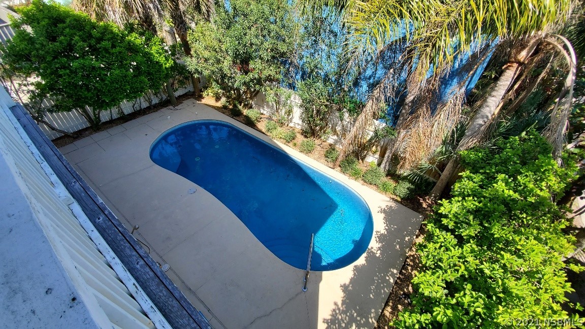 6273 Engram Road New Smyrna Beach, FL 32169 - Photo 19 of 34 a view of outdoor space and swimming pool