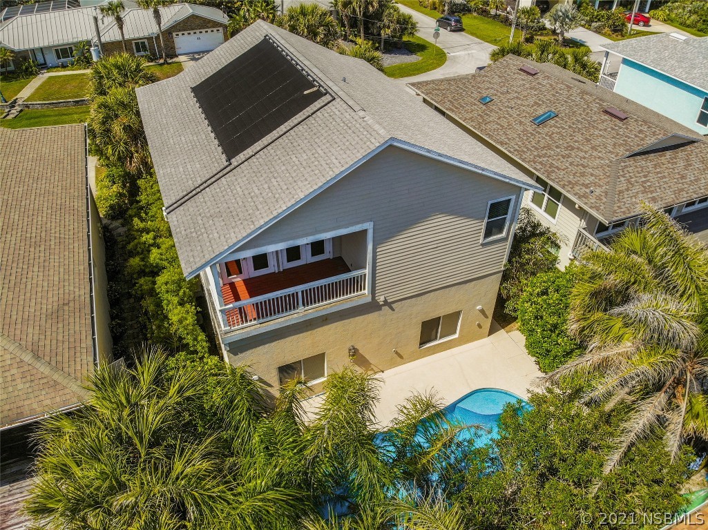 6273 Engram Road New Smyrna Beach, FL 32169 - Photo 32 of 34 a aerial view of a house with a yard