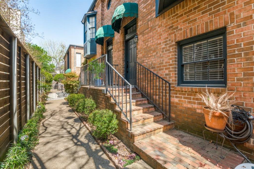 4143 Newton Avenue, Unit B Dallas, TX 75219 - Photo 1 of 1 a view of a pathway with a house in the background