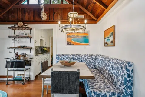 a kitchen with a stove and a refrigerator