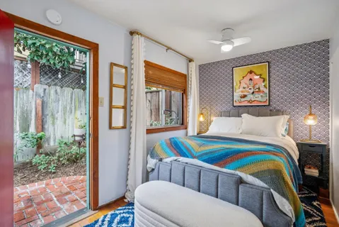 a room with furniture and painting on the wall