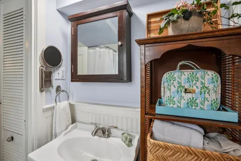 a view of walk in closet with window