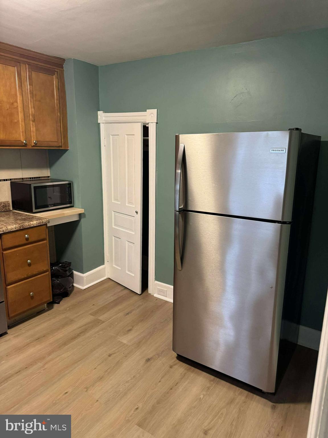 1931 Valley Road, Unit 2 Parkesburg, PA 19365 - Photo 5 of 10 a kitchen with a refrigerator and a stove