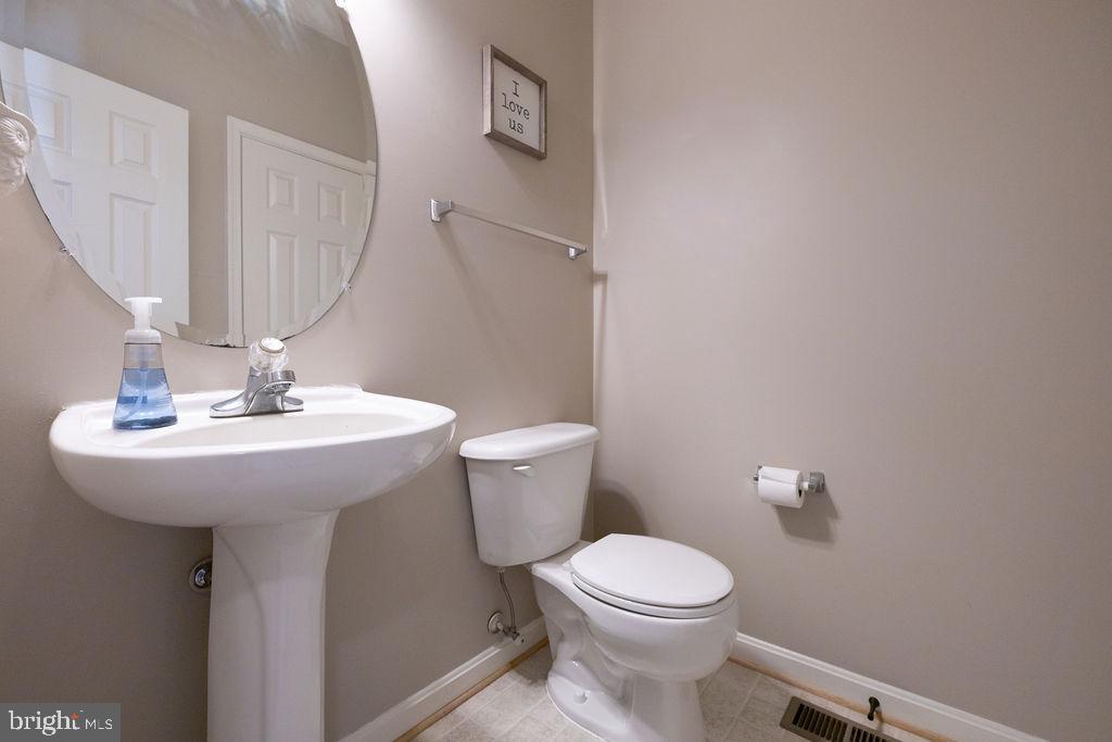 8896 Mullen Road King George, VA 22485 - Photo 17 of 48 Chic and modern half-bath retreat.
