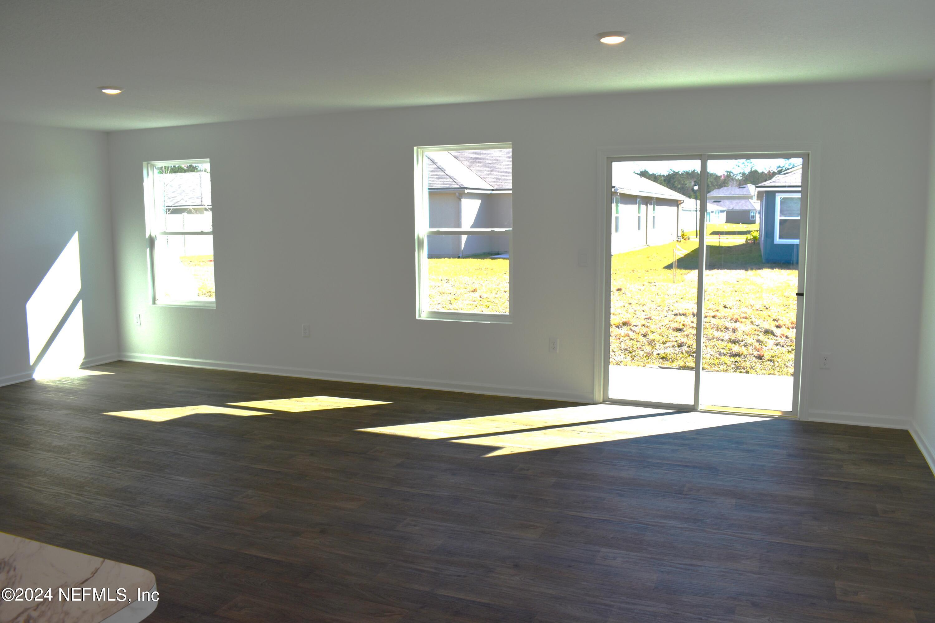 12725 European Beech Road Jacksonville, FL 32218 - Photo 15 of 36 a view of an empty room and window