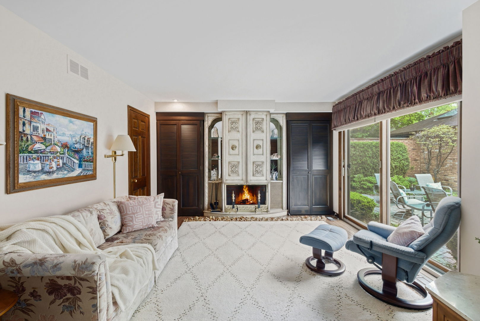 715 Tomlin Drive, Unit A1 Burr Ridge, IL 60527 - Photo 7 of 24 a living room with furniture and large windows
