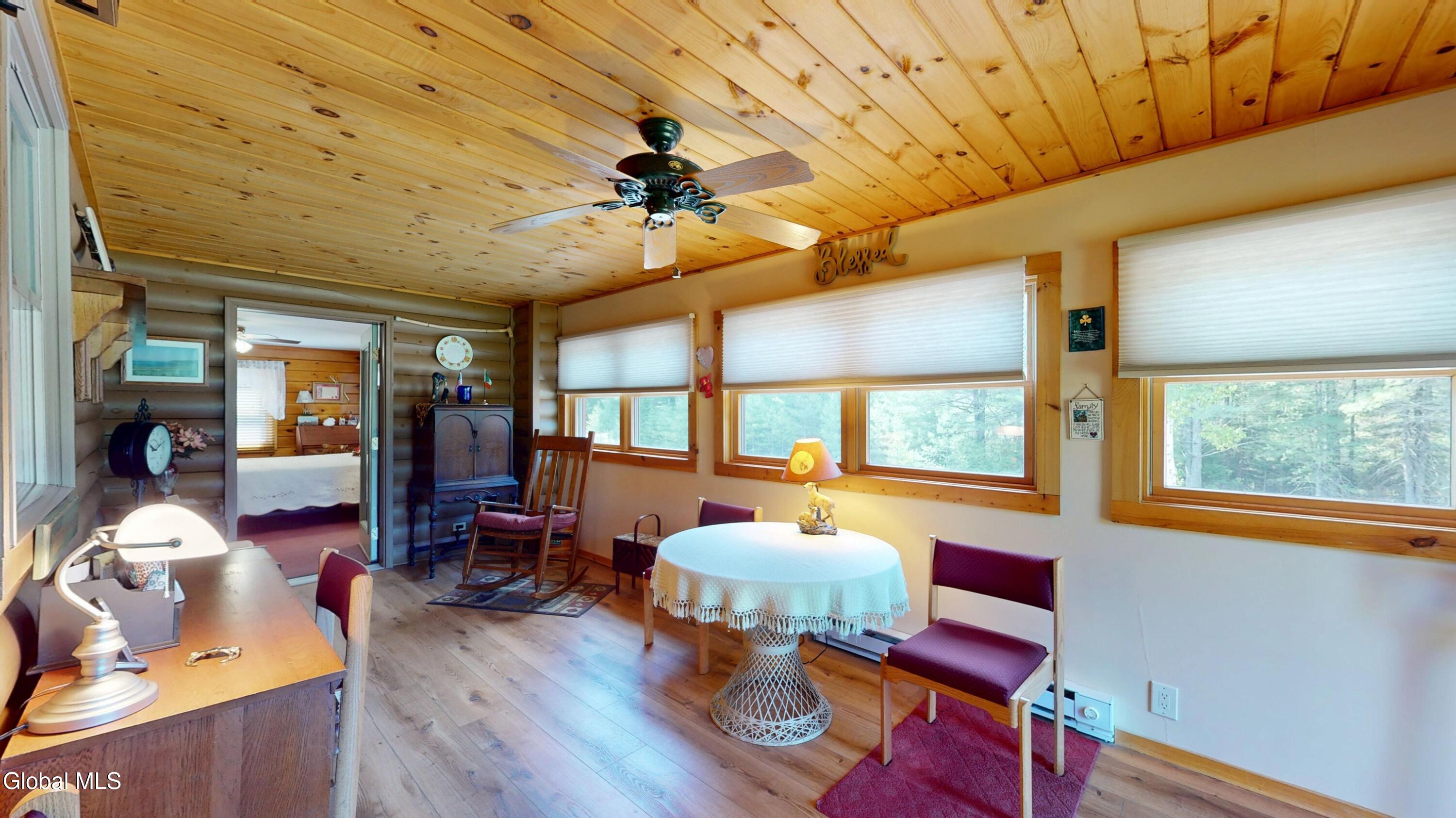 754 Church Road Minerva, NY 12857 - Photo 14 of 55 sun room