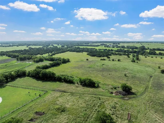 a view of a lush green field