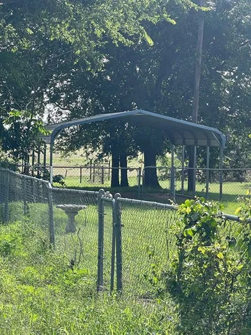 a view of swimming pool with patio
