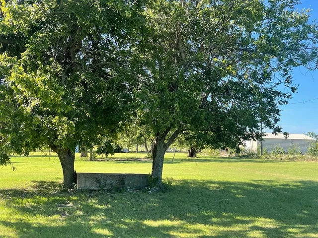 a view of swimming pool with an outdoor space and seating area