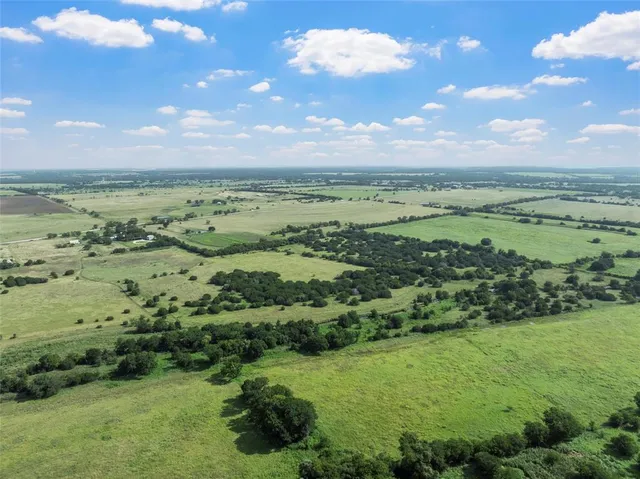 a view of a lake with a city
