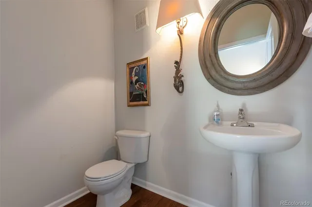 a bathroom with a toilet and a sink