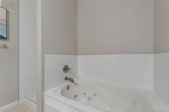 a bathroom with a bathtub