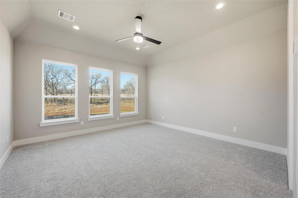 1053 Llano Way Poolville, TX 76487 - Photo 30 of 40 an empty room with a empty space and a window