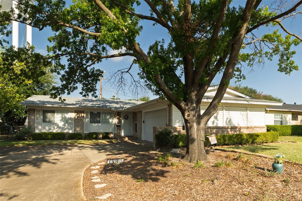 3605 Pleasant Run Road Irving, TX 75062 - Photo 2 of 32 Single-story residence featuring a brick and siding exterior, an attached garage, and a concrete driveway
