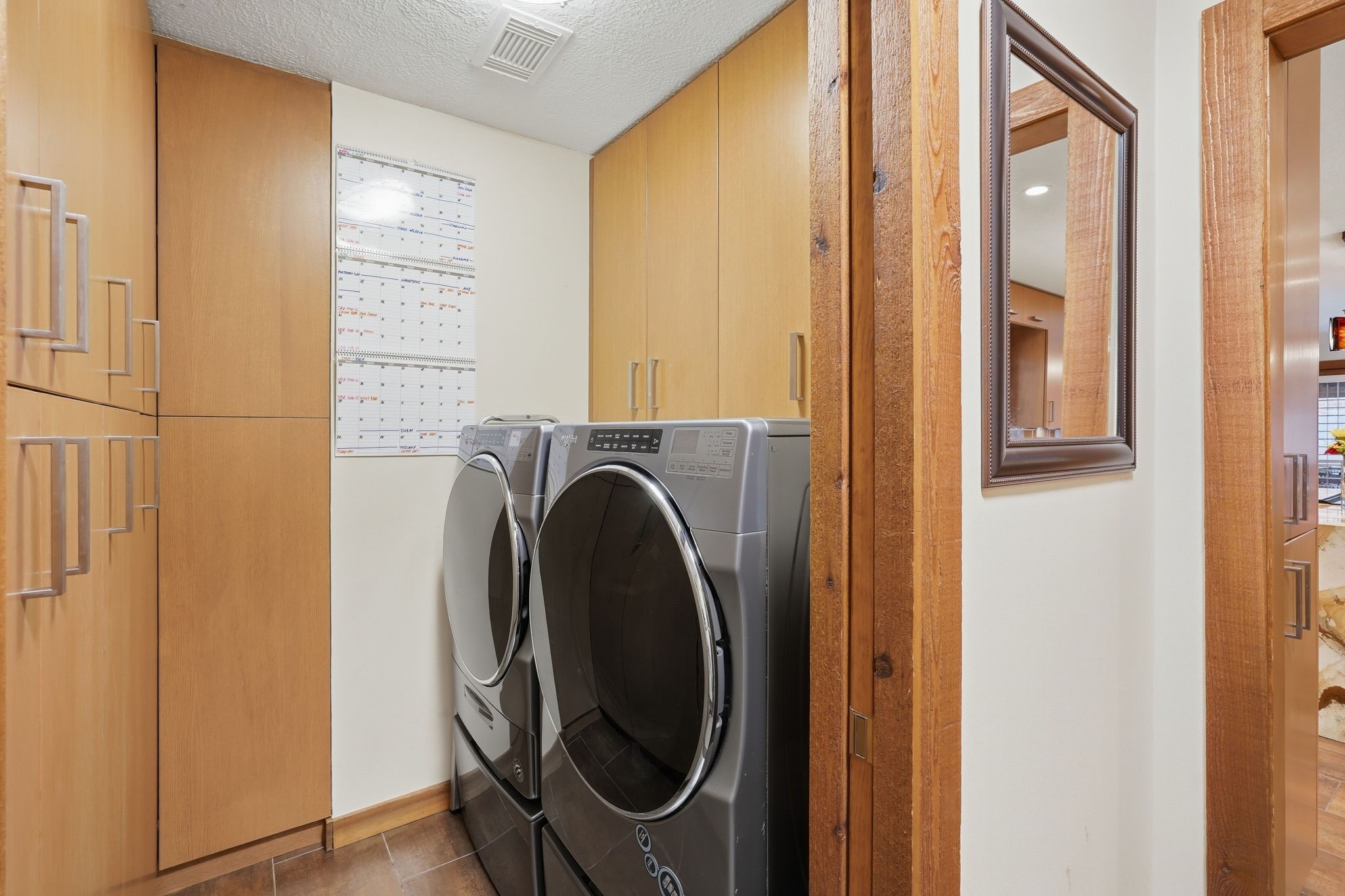 15007 Benfer Road Houston, TX 77069 - Photo 33 of 42 In-house utility room with storage and a pocket door!