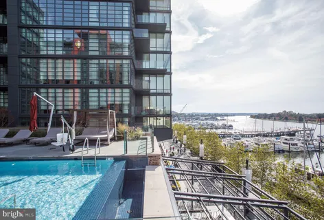a view of a balcony with ocean view
