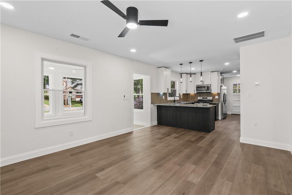 1658 Altadena Place Southwest Atlanta, GA 30311 - Photo 18 of 47 a view of kitchen with wooden floor