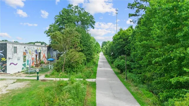 a view of a pathway with a houses