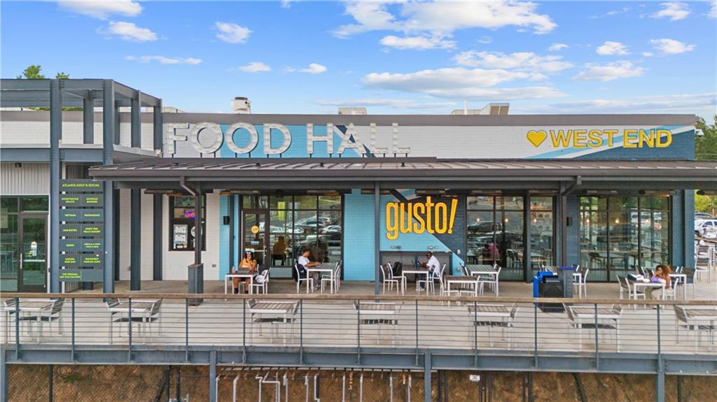 1658 Altadena Place Southwest Atlanta, GA 30311 - Photo 40 of 47 a view of a swimming pool with an outdoor seating