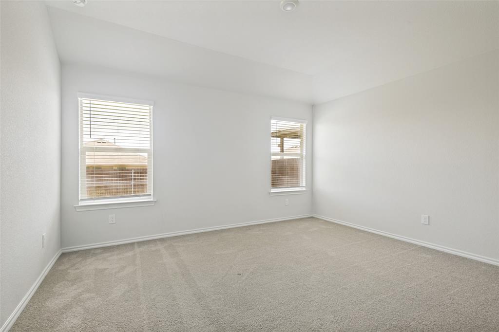 621 Spaulding Street Justin, TX 76247 - Photo 17 of 22 an empty room with a window