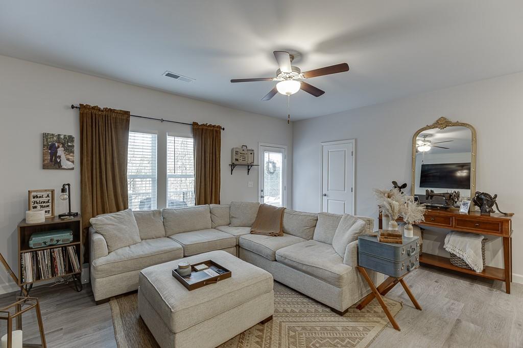 3712 Abbey Way Gainesville, GA 30507 - Photo 11 of 44 a living room with furniture and a large window