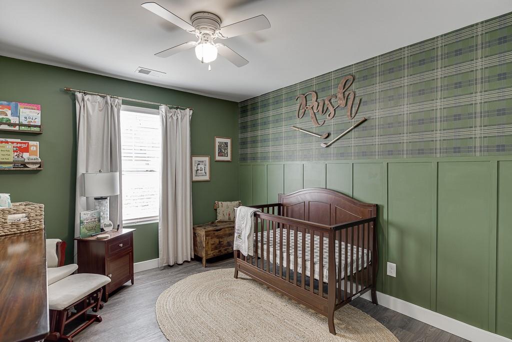 3712 Abbey Way Gainesville, GA 30507 - Photo 27 of 44 a bedroom with furniture and a window