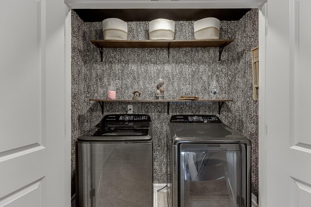 3712 Abbey Way Gainesville, GA 30507 - Photo 32 of 44 a kitchen with stainless steel appliances granite countertop a stove and a microwave