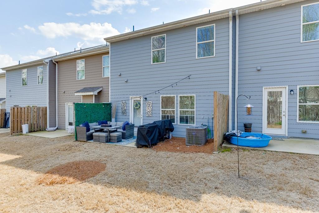 3712 Abbey Way Gainesville, GA 30507 - Photo 37 of 44 a view of a house with backyard and sitting area