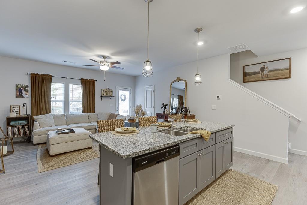 3712 Abbey Way Gainesville, GA 30507 - Photo 6 of 44 a view of living room with granite countertop furniture and fireplace