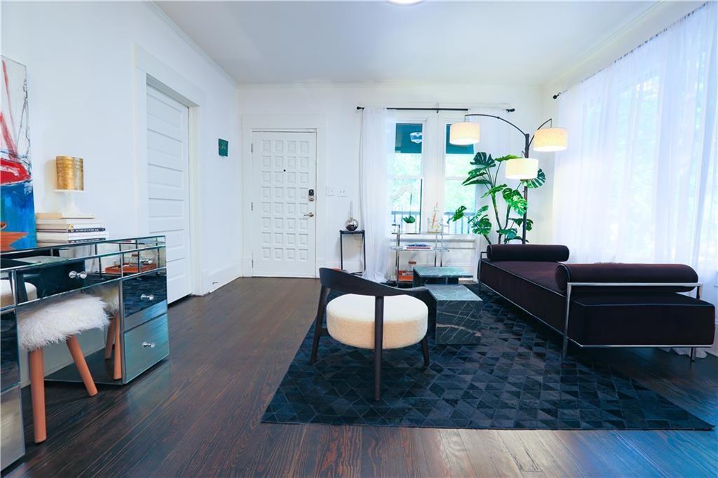 938 Ormewood Avenue Southeast Atlanta, GA 30316 - Photo 2 of 21 a living room with furniture and a wooden floor