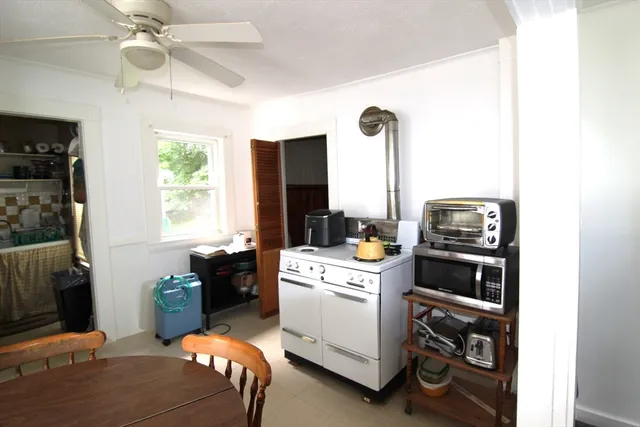 a view of kitchen and sink