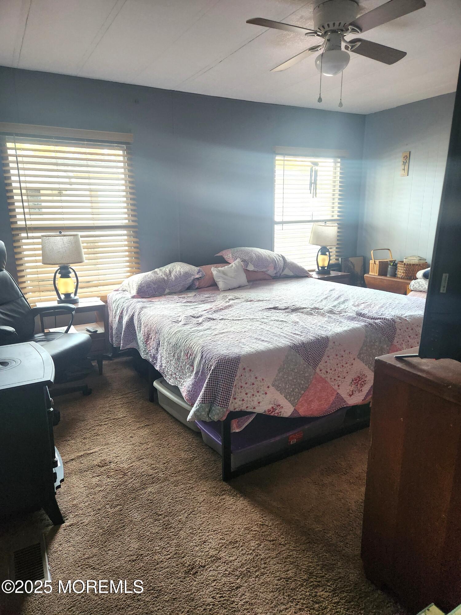 165 Mockingbird Way Manchester Township, NJ 08759 - Photo 11 of 20 a spacious bedroom with a bed and a window