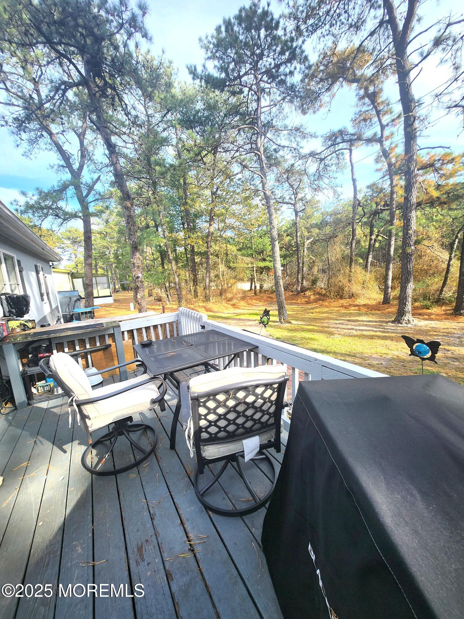 165 Mockingbird Way Manchester Township, NJ 08759 - Photo 19 of 20 a view of outdoor space with seating area