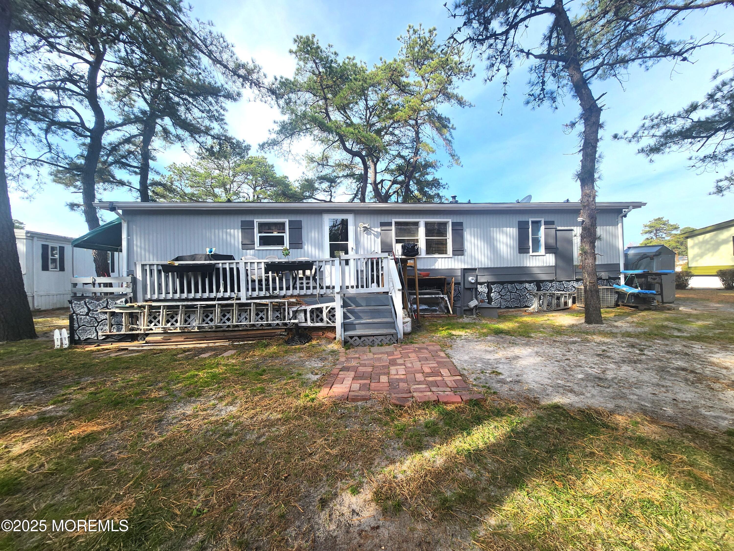 165 Mockingbird Way Manchester Township, NJ 08759 - Photo 2 of 20 a view of a house with swimming pool and porch with furniture