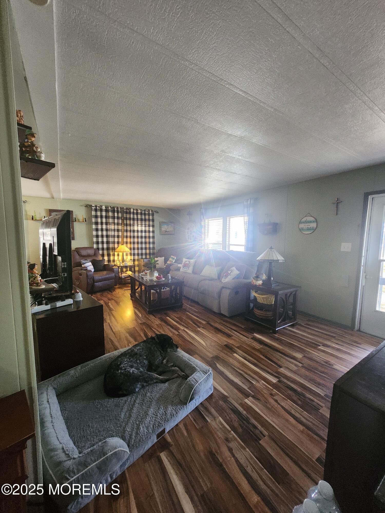 165 Mockingbird Way Manchester Township, NJ 08759 - Photo 6 of 20 a bedroom with a bed window and couch