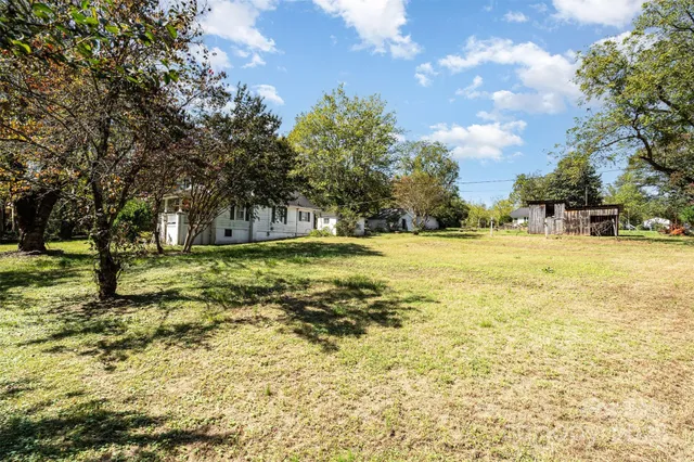 a view of a pool with an outdoor space