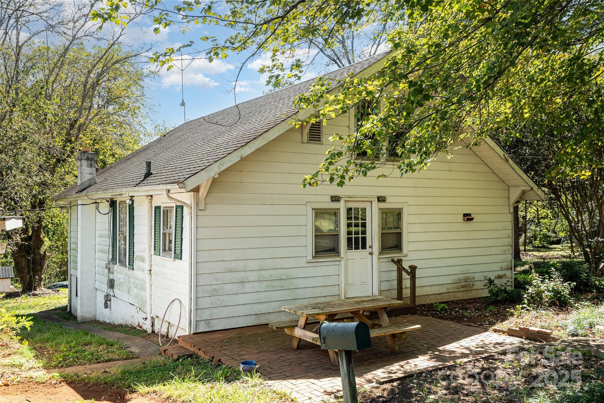 1245 Harrison Loop Morganton, NC 28655 - Photo 17 of 20 a view of a small house with a yard