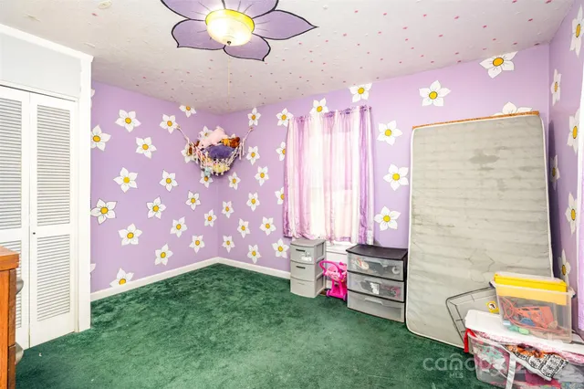 a bathroom with a sink mirror and vanity