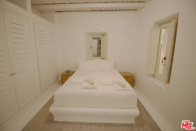 a bathroom with a tub and shower