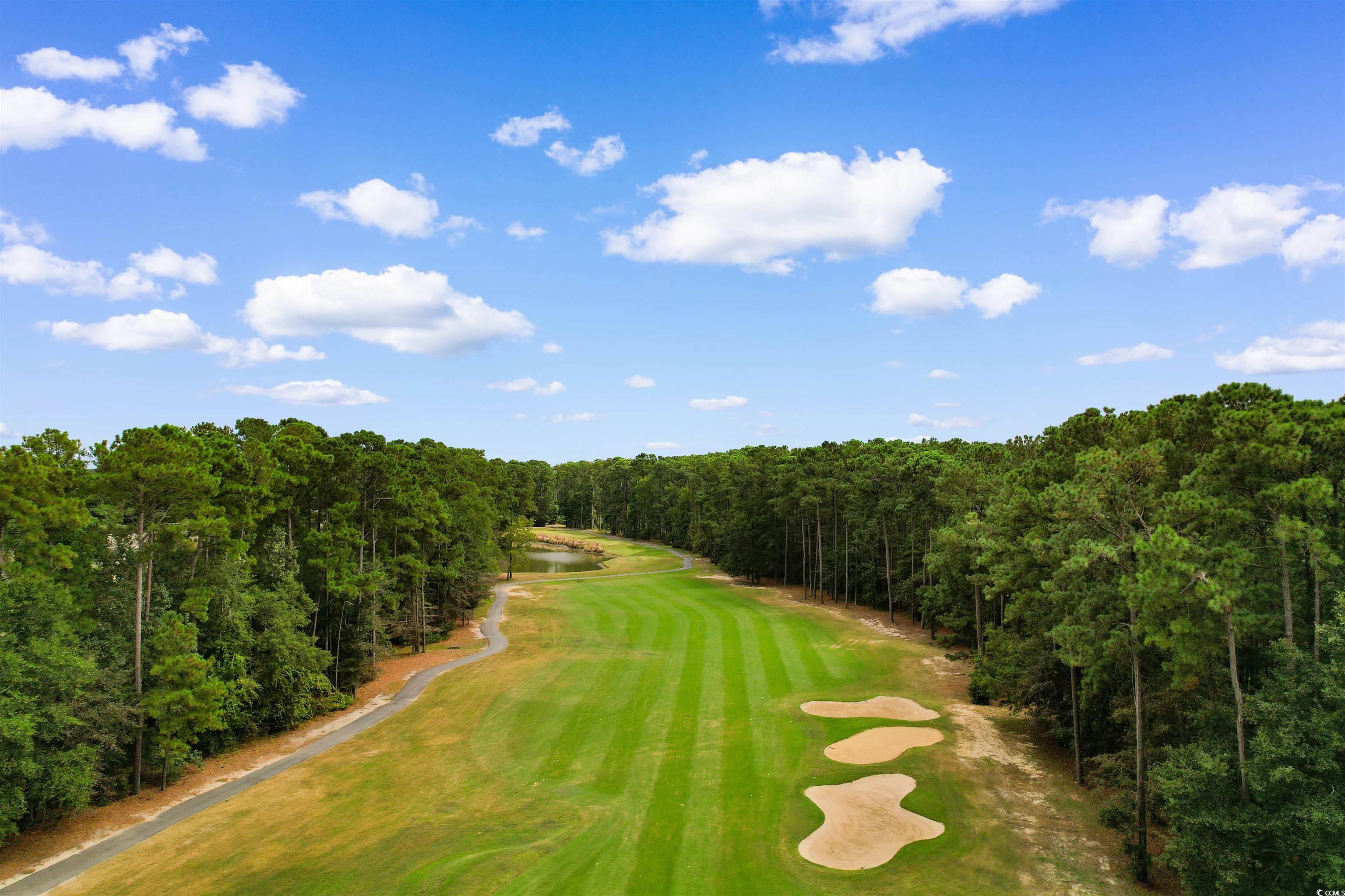 4430 Lady Banks Lane, Unit A2 Murrells Inlet, SC 29576 - Photo 29 of 31 Surrounding community featuring view of golf course and a wooded view