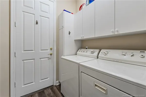 a utility room with dryer and washer