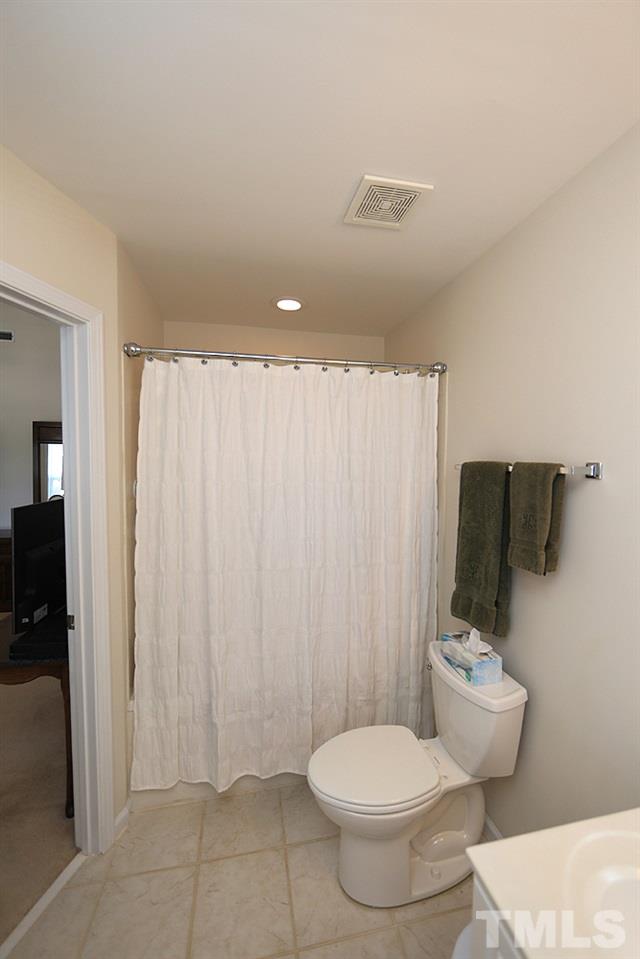2041 Rivergate Road, Unit 103 Raleigh, NC 27614 - Photo 13 of 21 Master bath features large jetted tub and dual vanities