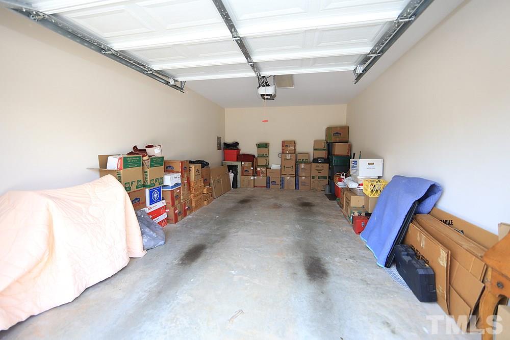 2041 Rivergate Road, Unit 103 Raleigh, NC 27614 - Photo 20 of 21 At 23 feet deep, you can store your extra belongings in the garage and STILL park your vehicle inside!