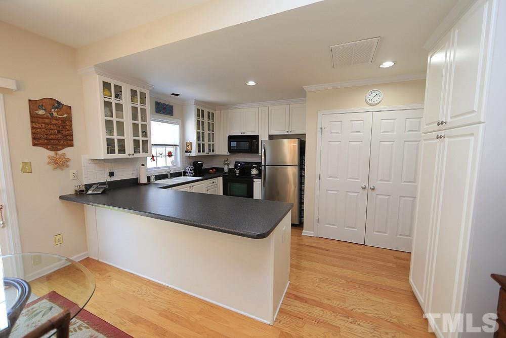 2041 Rivergate Road, Unit 103 Raleigh, NC 27614 - Photo 6 of 21 Plenty of workspace and cabinets make this a very efficient kitchen, and the 1-year old SS refrigerator conveys!