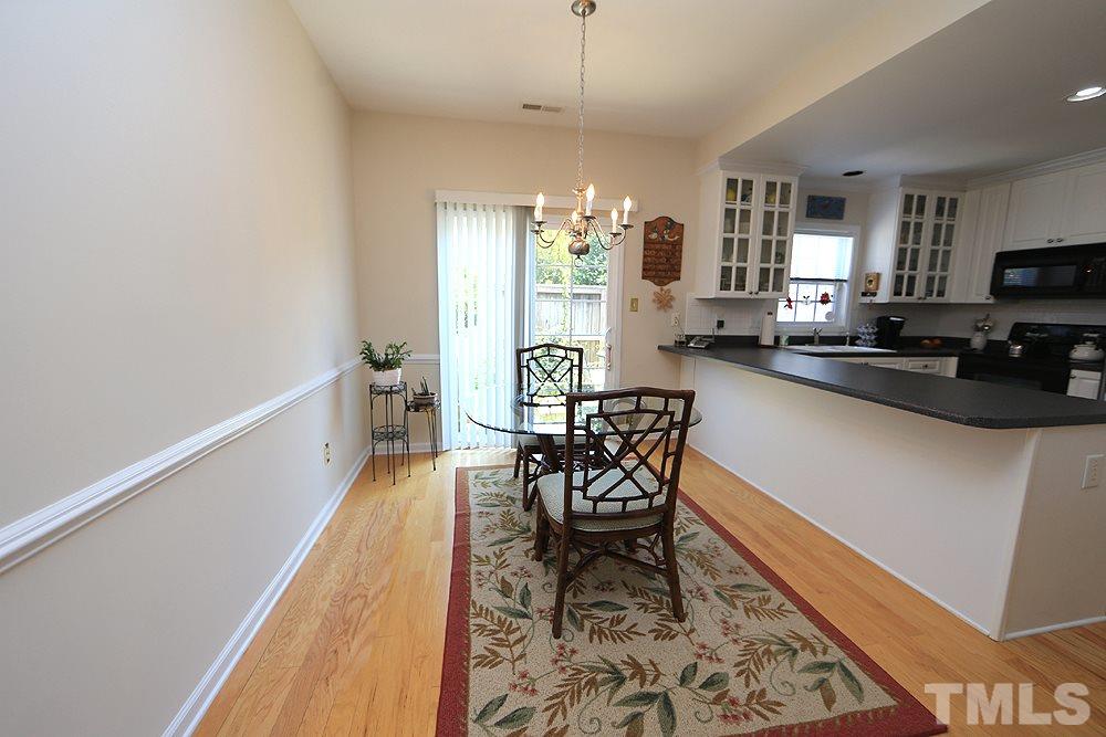 2041 Rivergate Road, Unit 103 Raleigh, NC 27614 - Photo 7 of 21 Enjoy abundant natural light in the eating area provided by an upgraded Pella sliding door!